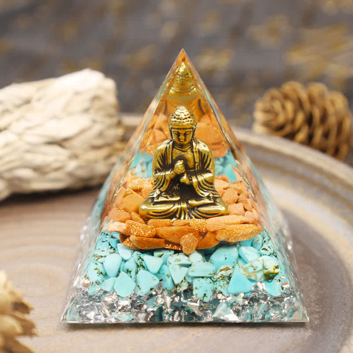 Piramide di arenaria Olivenorma con Buddha in orgone turchese 