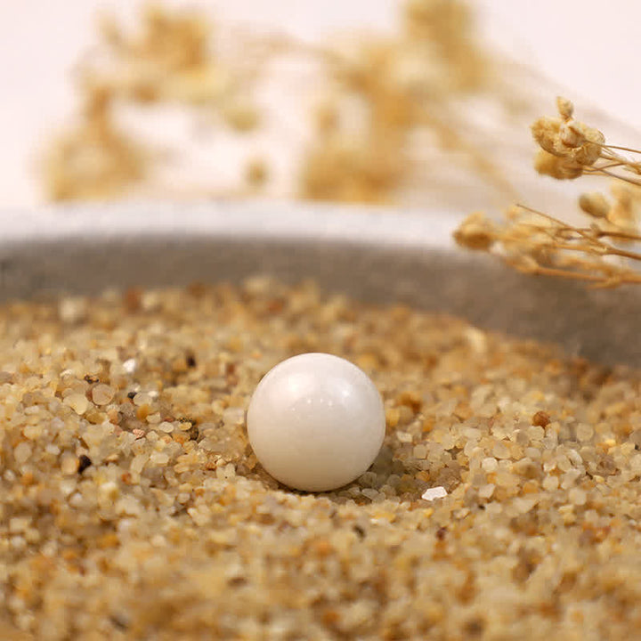 Sfera di cristallo di trasformazione in giada bianca Olivenorma