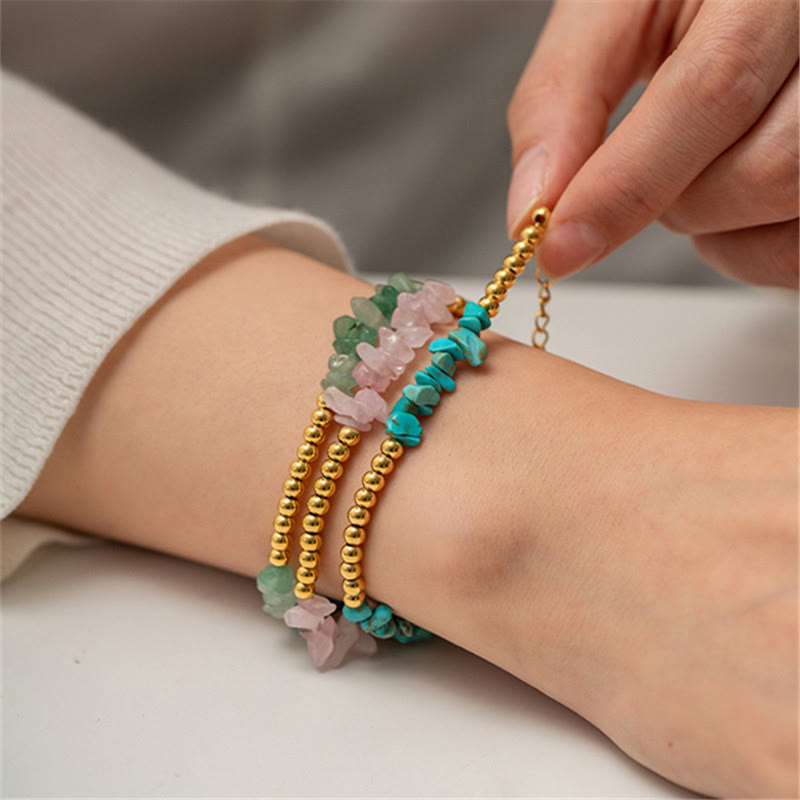 Bracciale Olivenorma con perline dorate in cristalli naturali frantumati