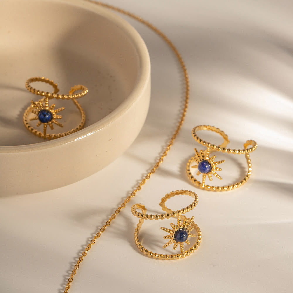 Anello con gemma a forma di stella a otto punte e doppia fila di girasole Olivenorma