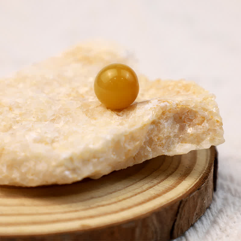 Sfera di cristallo positivo di giada gialla Olivenorma