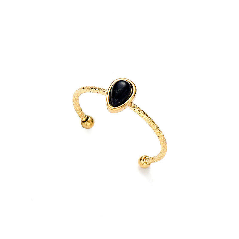 Anello in acciaio al titanio 18k con goccia d'acqua in pietra naturale Olivenorma