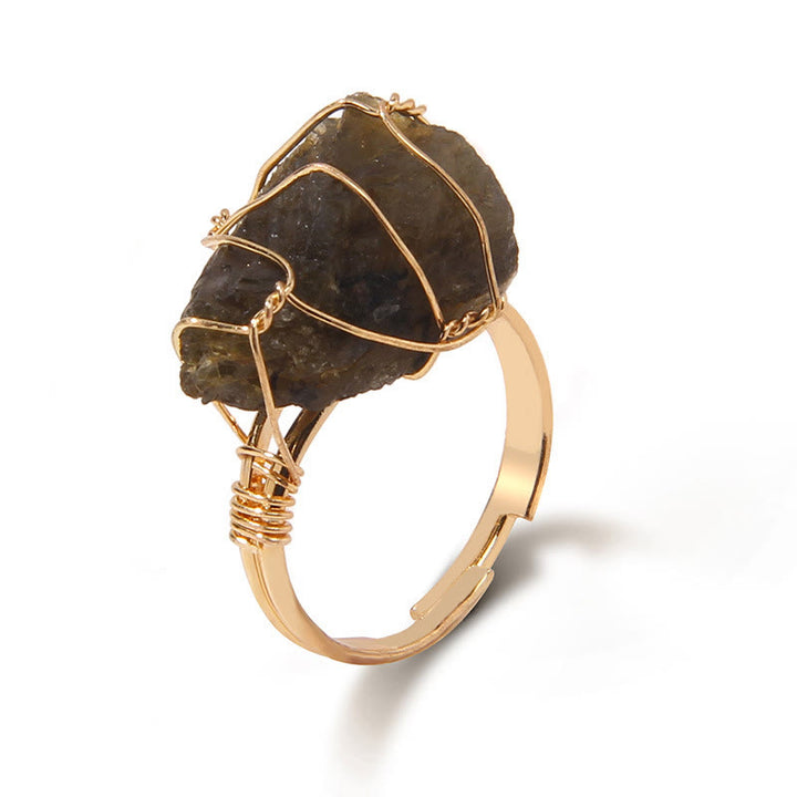 Anello con pietra preziosa naturale irregolare e ruvida Olivenorma