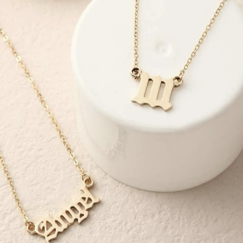 Collana doppia delicata con numero angolare e angelo Olivenorma 