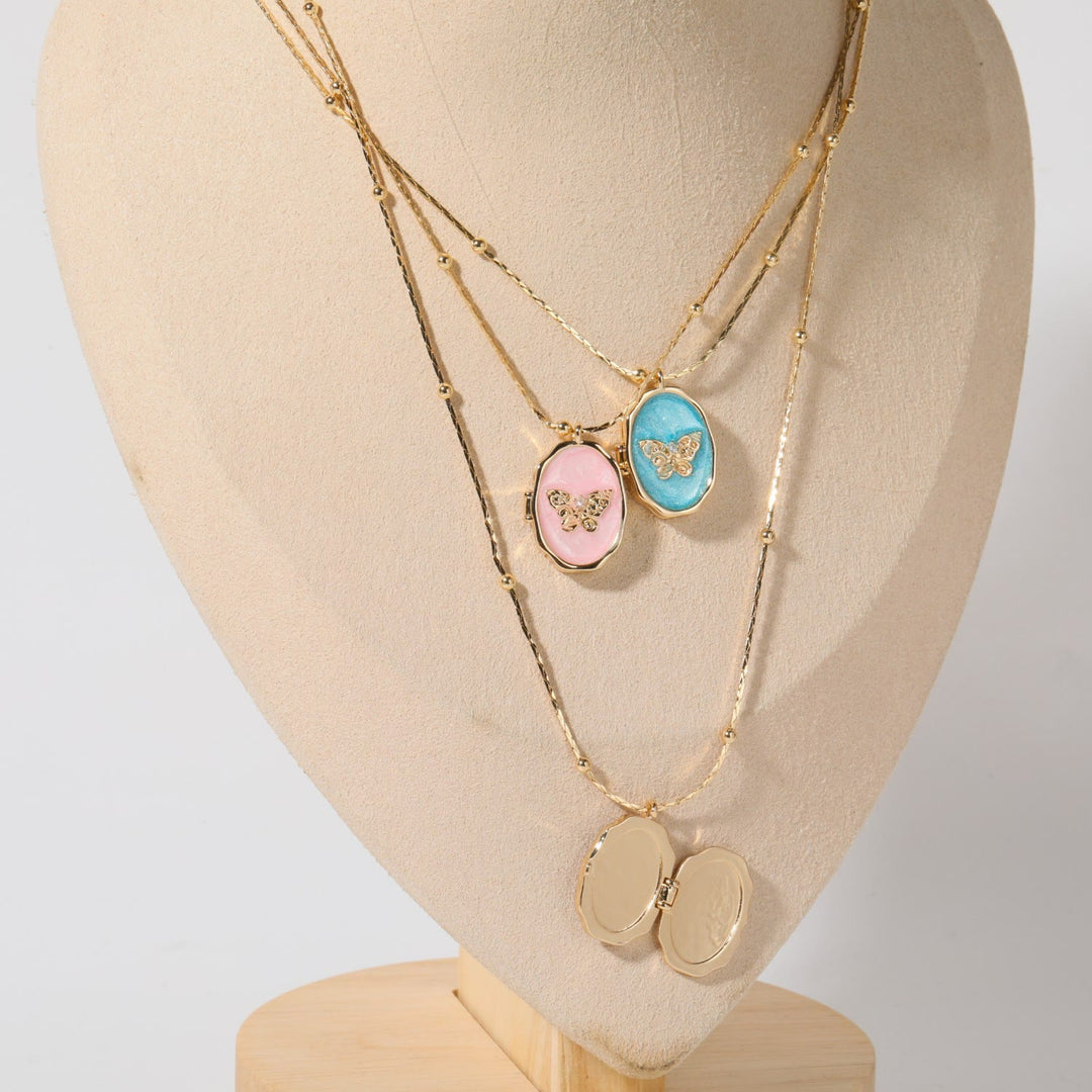 Collana con pendente a farfalla in madreperla Olivenorma in rame placcato oro 14k 