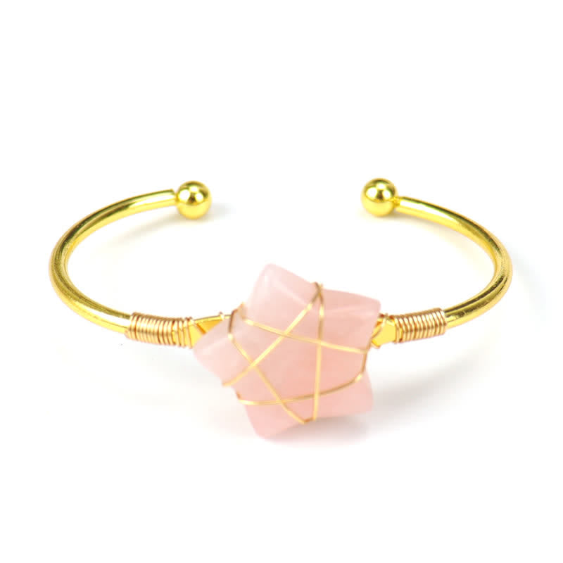 Bracciale Olivenorma con pietre preziose a forma di stella avvolte in filo d'oro