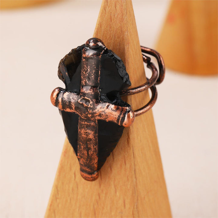 Anello a forma di croce con scudo in ossidiana naturale Olivenorma