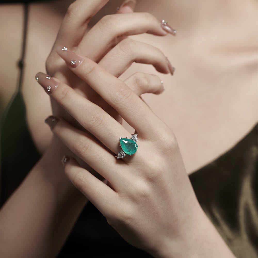 Anello squisito con tormalina Paraiba Olivenorma e zircone bianco