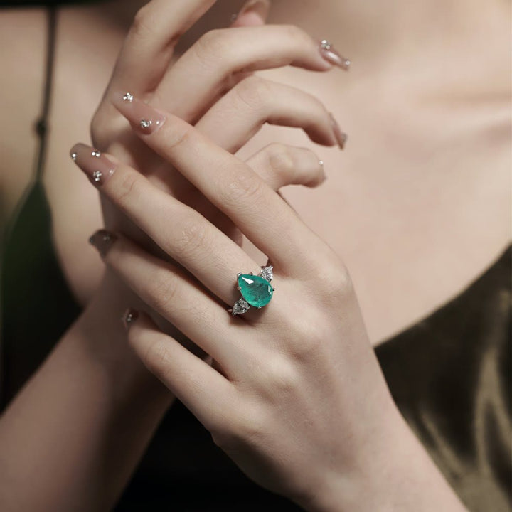 Anello squisito con tormalina Paraiba Olivenorma e zircone bianco