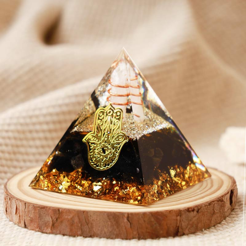 Olivenorma Cristallo trasparente con piramide di ossidiana Hamsa Orgone 