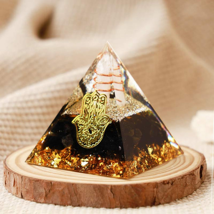 Olivenorma Cristallo trasparente con piramide di ossidiana Hamsa Orgone 