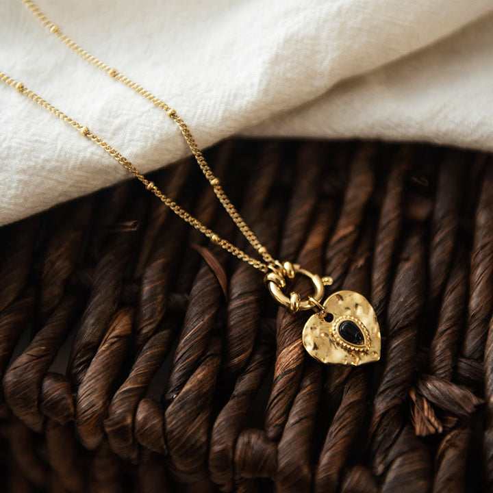 Collana con ciondolo in acciaio al titanio con cuore turchese nero Olivenorma 