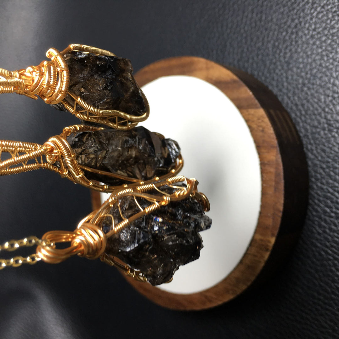 Collana con ciondolo in filo di rame avvolto in quarzo fumé naturale Olivenorma