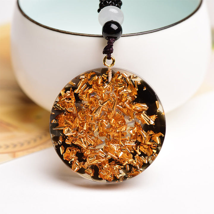 Collana con simbolo dell'occhio di Horus in ossidiana e agata rossa Olivenorma