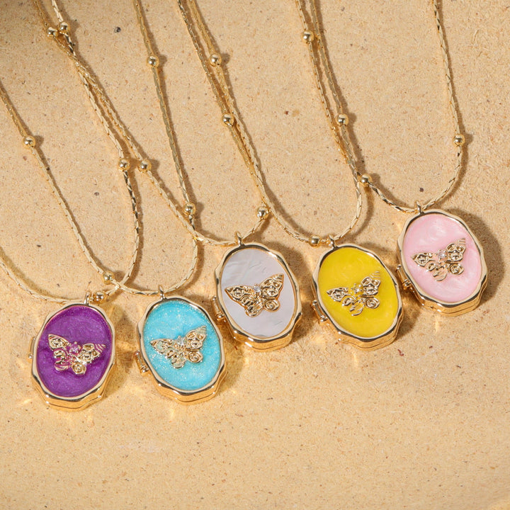 Collana con pendente a farfalla in madreperla Olivenorma in rame placcato oro 14k 