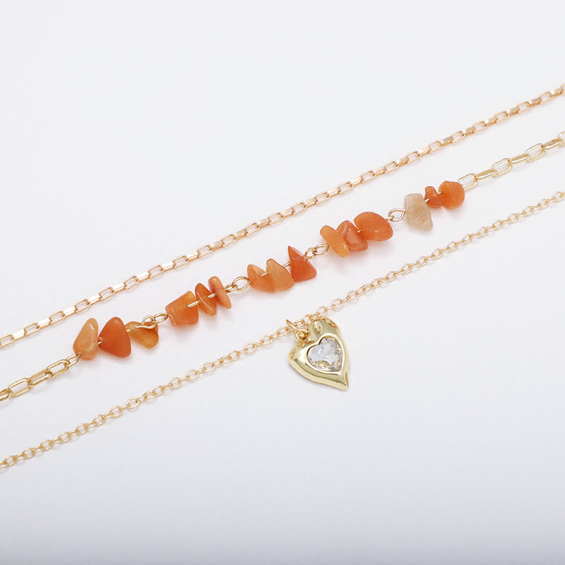 Collana a strati con ciondolo a forma di cuore irregolare in zircone bianco e agata Olivenorma