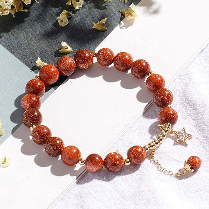 Olivenorma "Ricchezza e fortuna" - Bracciale in cristallo lucido di arenaria