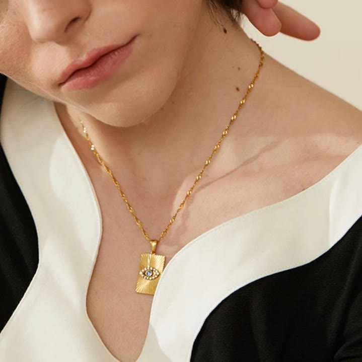 Collana con occhio maligno Olivenorma , topazio blu e zircone bianco 