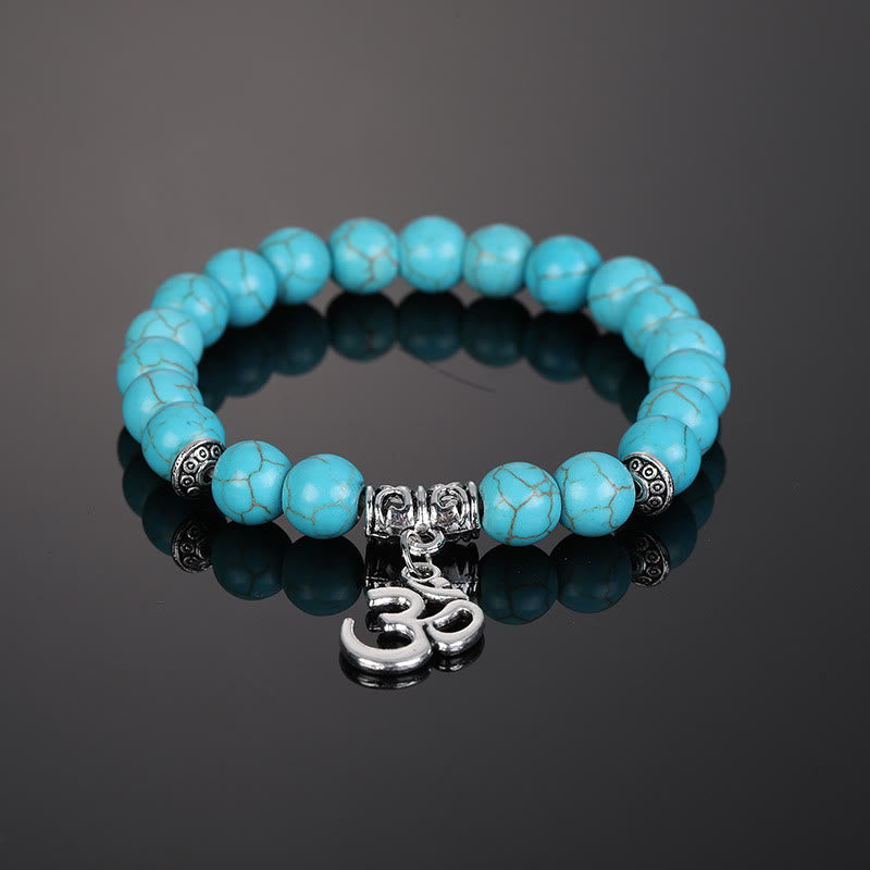 Bracciale con simbolo Om in perline di cristallo naturale Olivenorma
