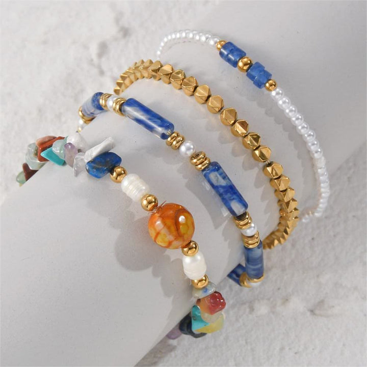 Olivenorma Set di quattro bracciali con perline in cristallo naturale 