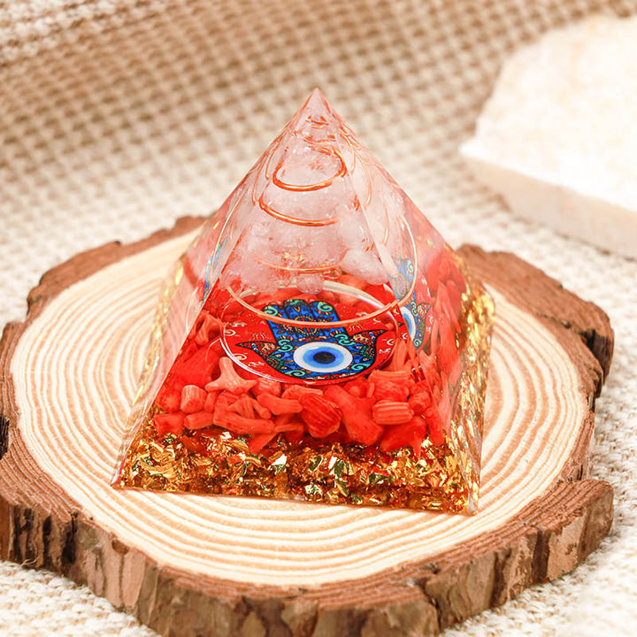 Olivenorma Clear Quartz con Hamsa di corallo rosso e piramide di orgone con occhio maligno 
