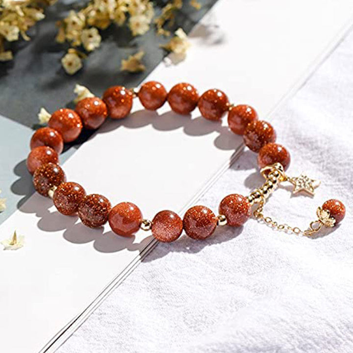 Olivenorma "Ricchezza e fortuna" - Bracciale in cristallo lucido di arenaria