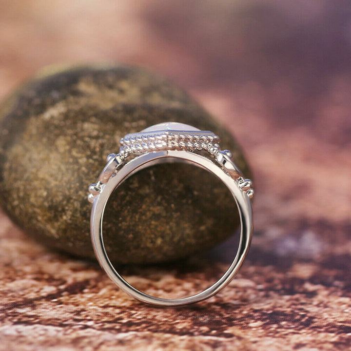 Anello in opale di fuoco taglio ovale Olivenorma