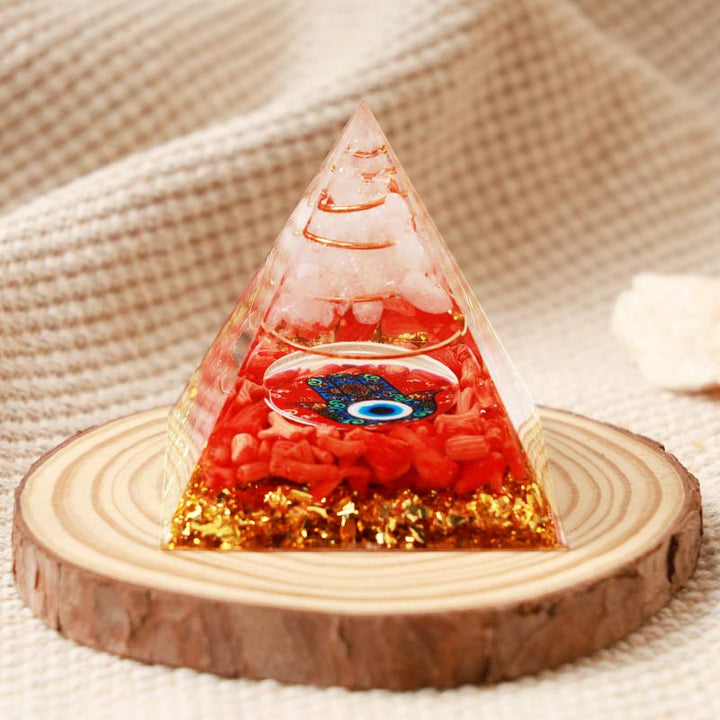 Olivenorma Clear Quartz con Hamsa di corallo rosso e piramide di orgone con occhio maligno 