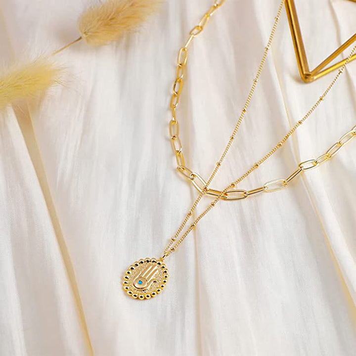 Olivenorma Collana con catena a strati color oro Hamsa Evil Eye