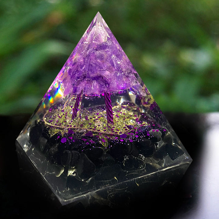 Sfera di ametista Olivenorma con piramide di orgone di ossidiana 