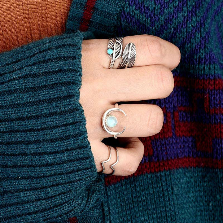 Anello con piuma turchese Olivenorma