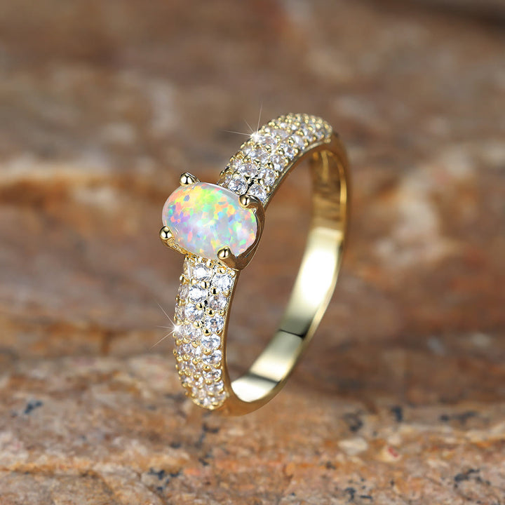 Anello Olivenorma "Shiny Elegance" con fascia in zircone e opale rotondo
