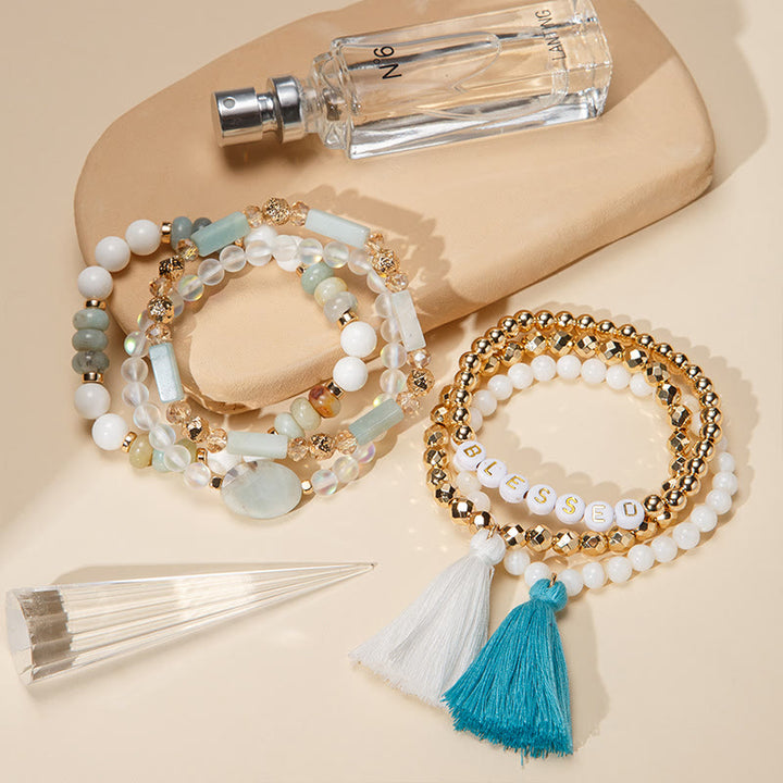 Olivenorma Set di 6 bracciali in cristallo naturale inciso